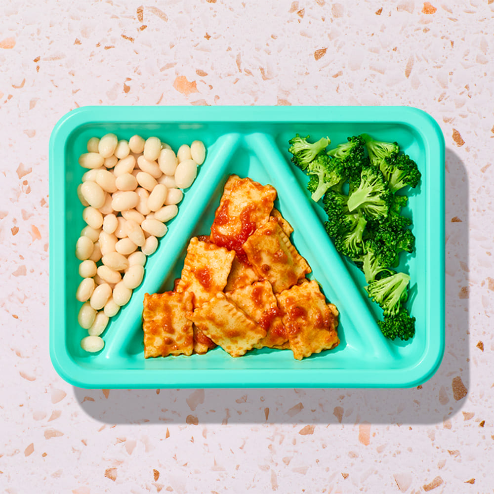 mini beef ravioli in a creamy tomato sauce + romanesco broccoli Florets + white beans Biteable